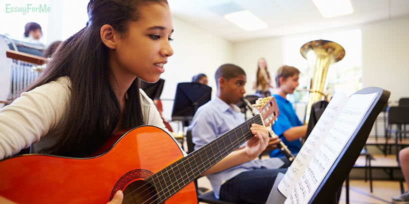 Student with Guitar